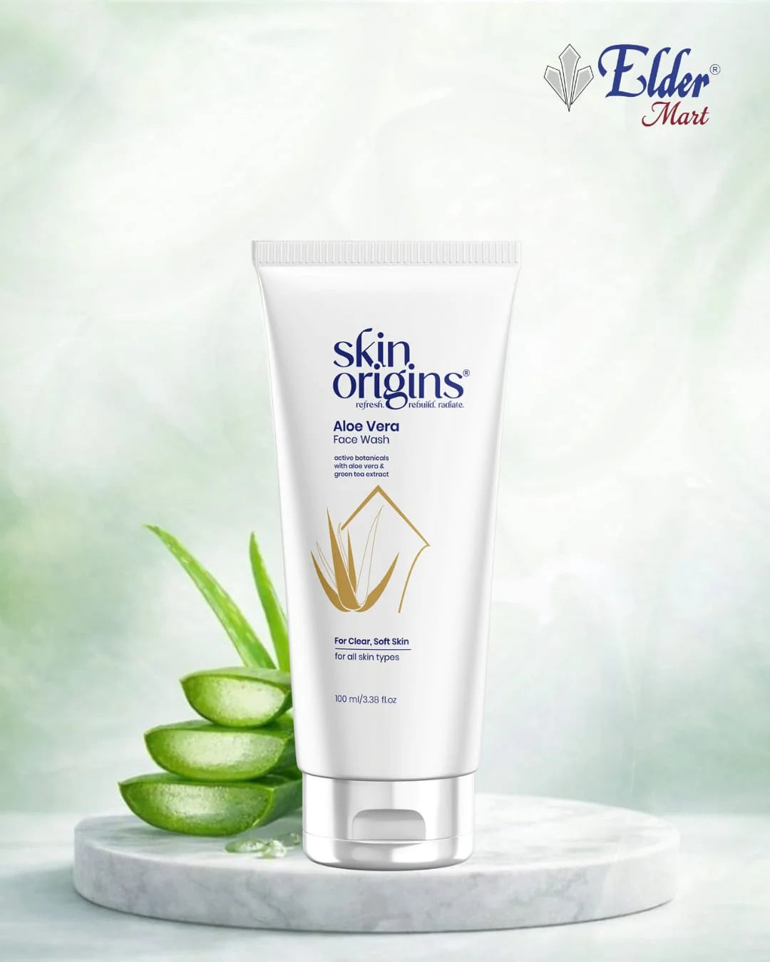 Tube of skin origins Aloe Vera Face Wash with aloe vera leaves on a light background